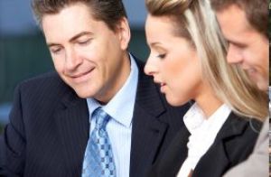 Business professionals reviewing documents